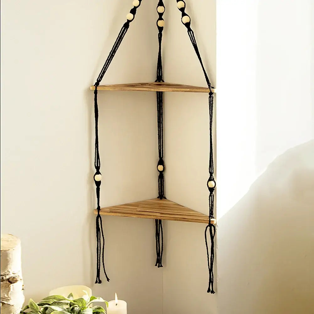 Decorbites™ wooden corner shelf with black macrame, light wood triangular shelves, and cream wooden beads for wall decor