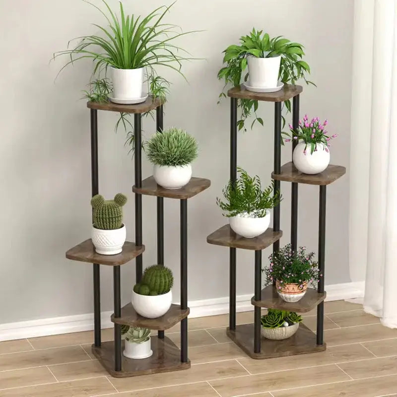Two tiered decorbites wooden flower plant stands with dark metal frames and rustic wooden shelves holding white ceramic pots