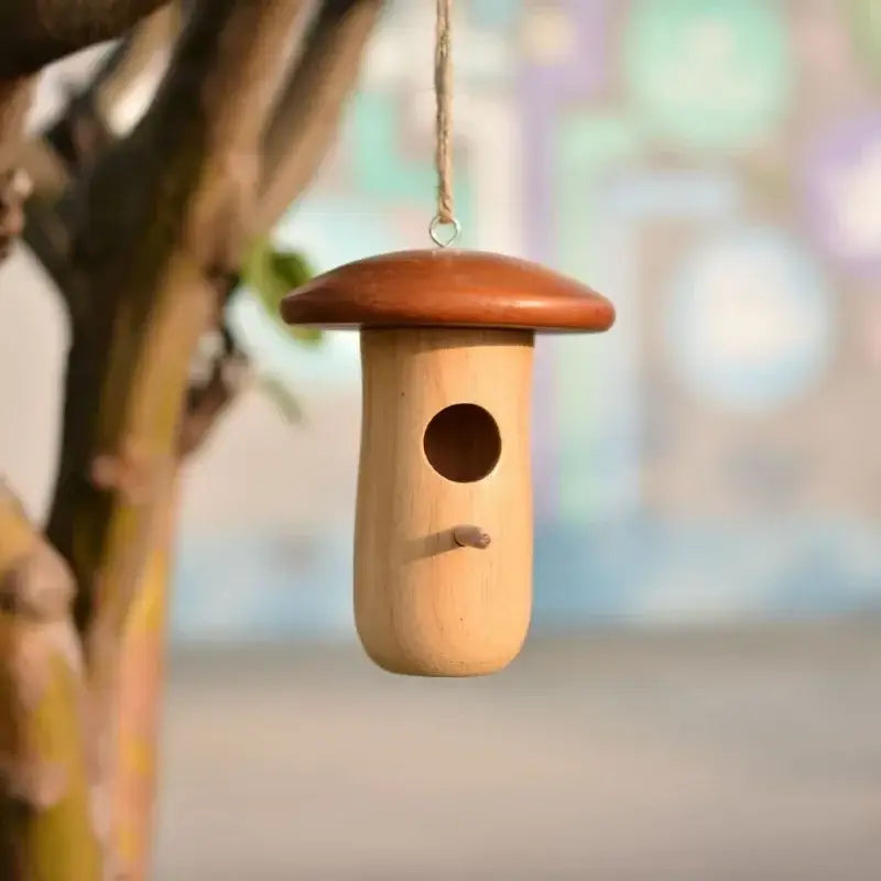 DecorBites™ wooden hanging hummingbird house feeder shaped like a light wood mushroom with a rich brown cap