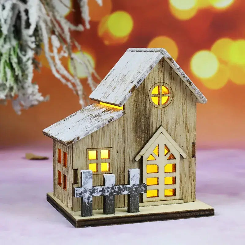 Decorbites™ wooden led light house christmas decoration with rustic wood, weathered white roof, glowing yellow windows, and picket fence
