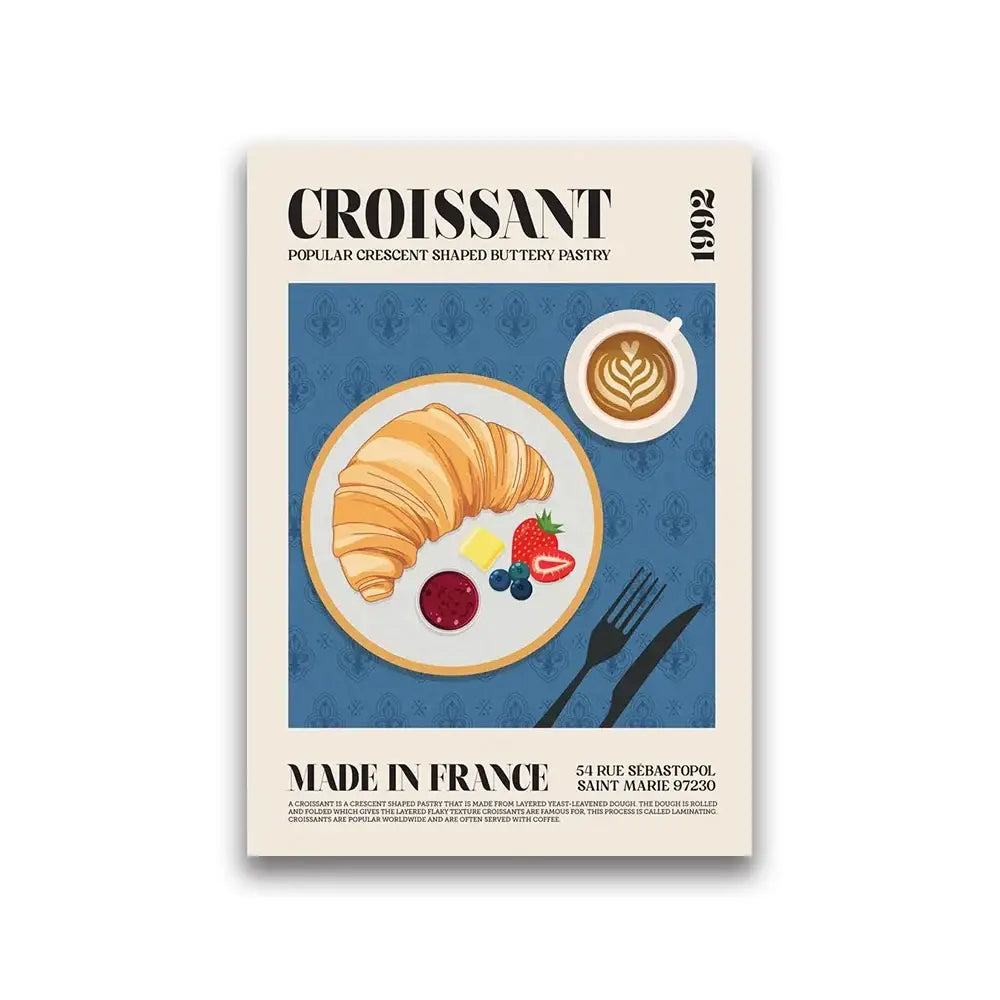 A golden-brown flaky croissant with a glossy sheen on a white plate featured in decorbites world cuisine canvas wall art