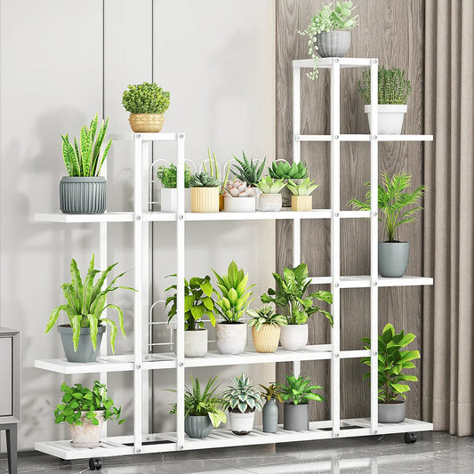 White wrought iron plant stand by DecorBites with multiple shelves and caster wheels for easy mobility
