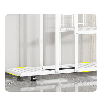 White metal rolling shelf with yellow accents and black wheels in a DecorBites wrought iron plant stand with wheels