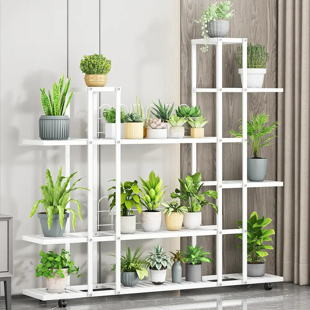 White wrought iron plant stand by DecorBites with multiple shelves and caster wheels for easy mobility
