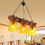 Decorbites™ yellow trapezoid island pendant light with copper-toned bamboo beam and yellow water glass shades 220v-240v 110v-120v
