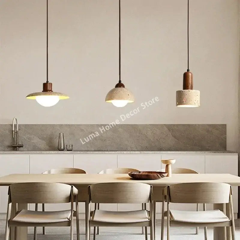 Decorbites yellow travertine pendant light with concrete stone pendant shades and copper accents for kitchen island lighting