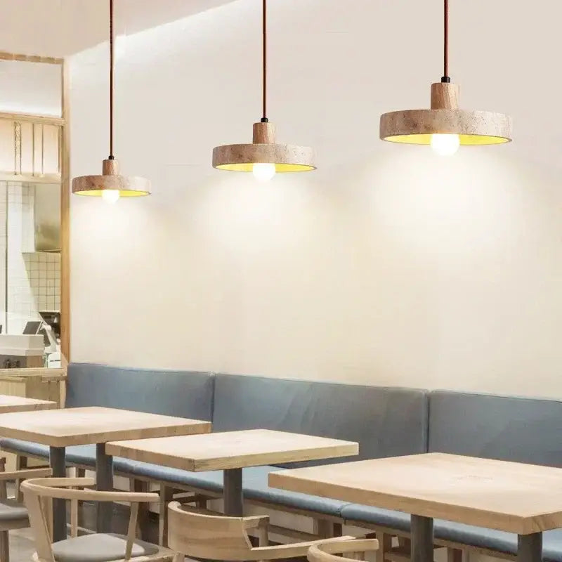 Decorbites yellow travertine pendant light stone pendant with circular concrete shades and warm yellow interiors