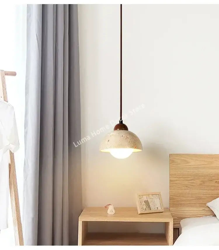 Decorbites™ yellow travertine stone pendant light with warm textured concrete and dark metal chain for kitchen island