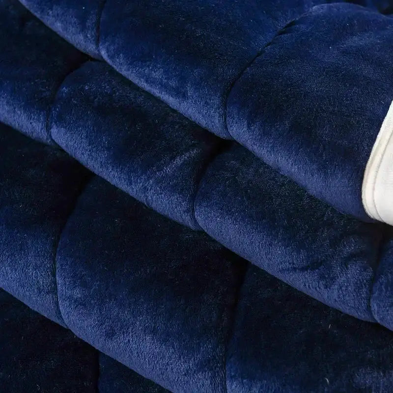 Deep navy blue plush quilted cozy flannel fleece bedroom quilt with soft velvety texture by decorbites cozy flannel