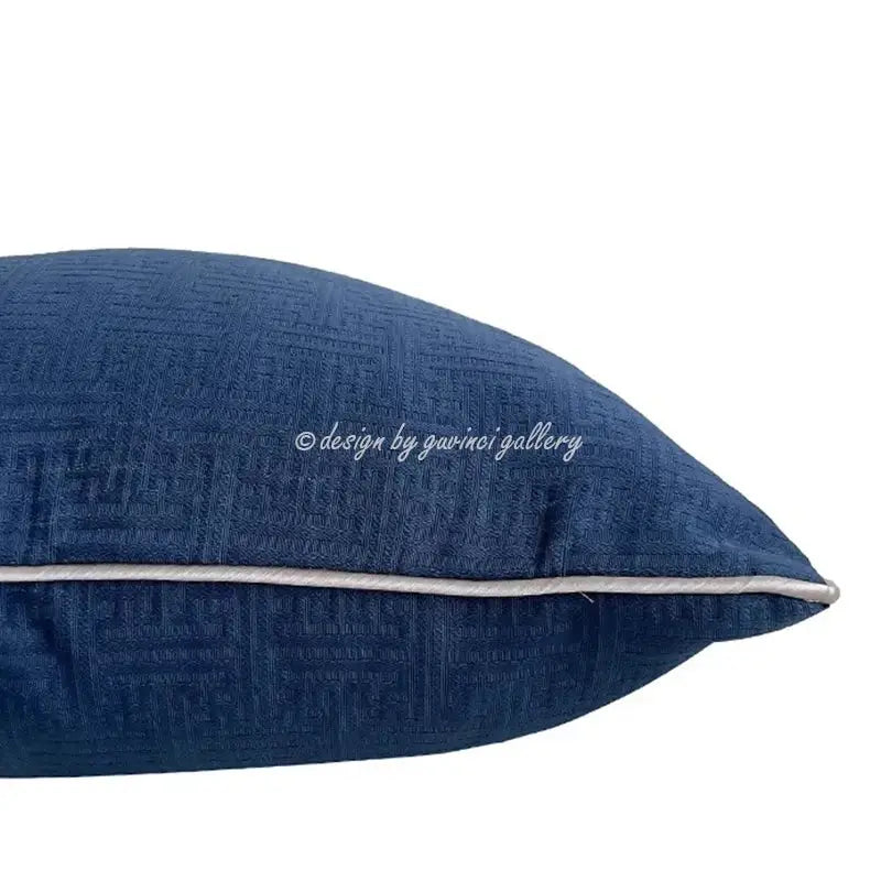 Deep blue geometric jacquard cushion cover with subtle woven pattern and light gray piping for living room decor