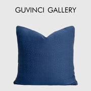 Deep blue geometric jacquard cushion cover with subtle woven pattern for living room decor by decorbites