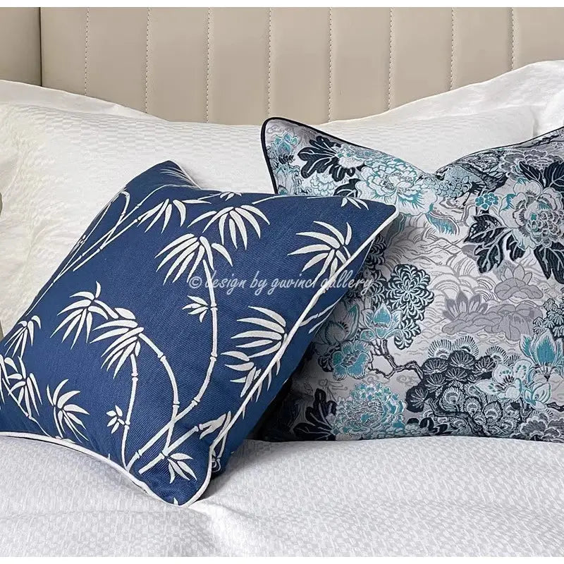 Deep blue geometric jacquard cushion cover with white bamboo leaf pattern and stitched trim for living room decorbites decor