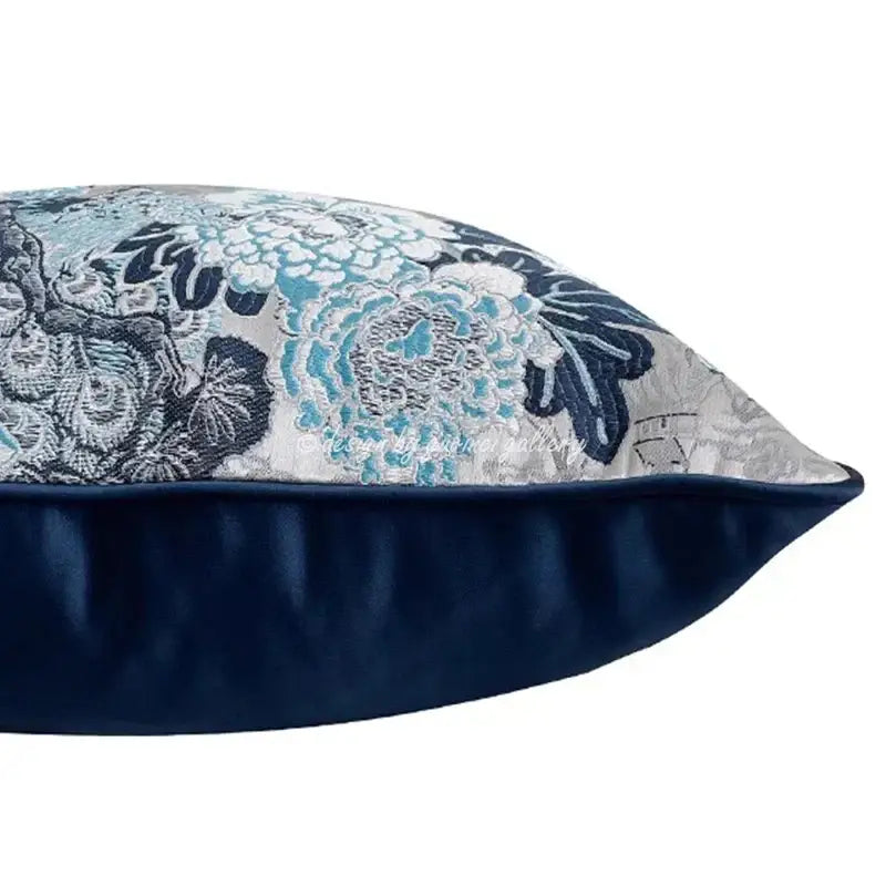 Rectangular deep blue geometric jacquard cushion cover with embroidered floral pattern and velvet trim for living room decor