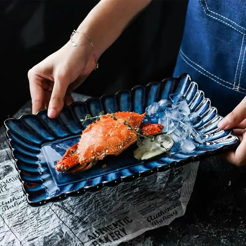 Deep blue klin glazed ceramic rectangle sushi tray with scalloped wavy edge for elegant dining room decorbites klin glazed