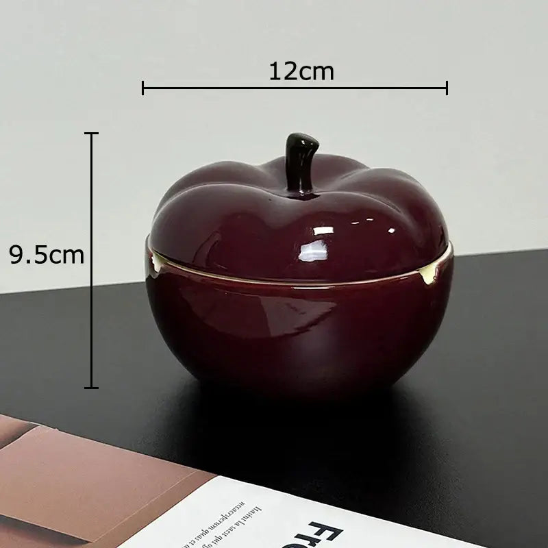 Deep red ceramic apple ashtray with lid featuring black stem and gold trim for decorbites deep red living room decor