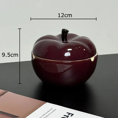 Deep red ceramic apple ashtray with lid featuring black stem and gold trim for decorbites deep red living room decor