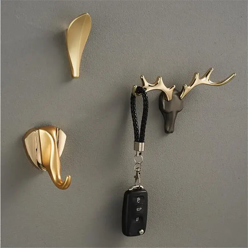 Gold deer head brass wall mount robe hook with black keychain and remote attached for bathroom towel holder decorbites brass wall