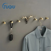 Gold-toned deer antler brass wall mount robe hook with sleek metallic finish for bathroom towel holder decorbites brass wall