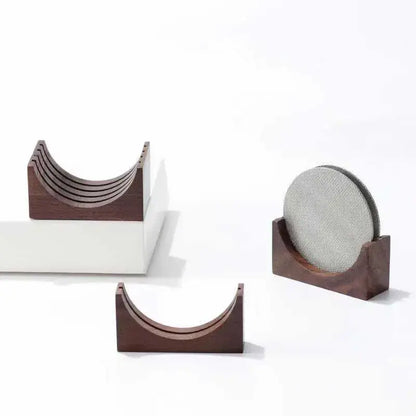 Dark wood coaster holder with textured gray circular insert featuring decorbites espresso puck screen design