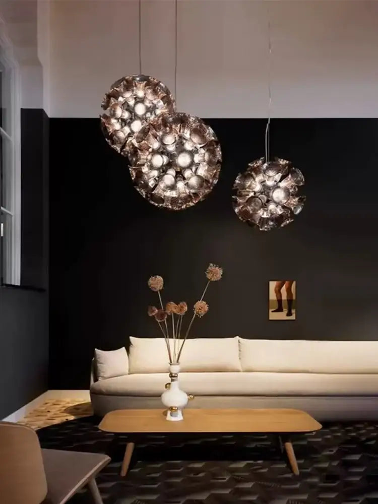 Three spherical metallic chalice lamps with faceted bubble design in gold by decorbites designer luxury for living room decor