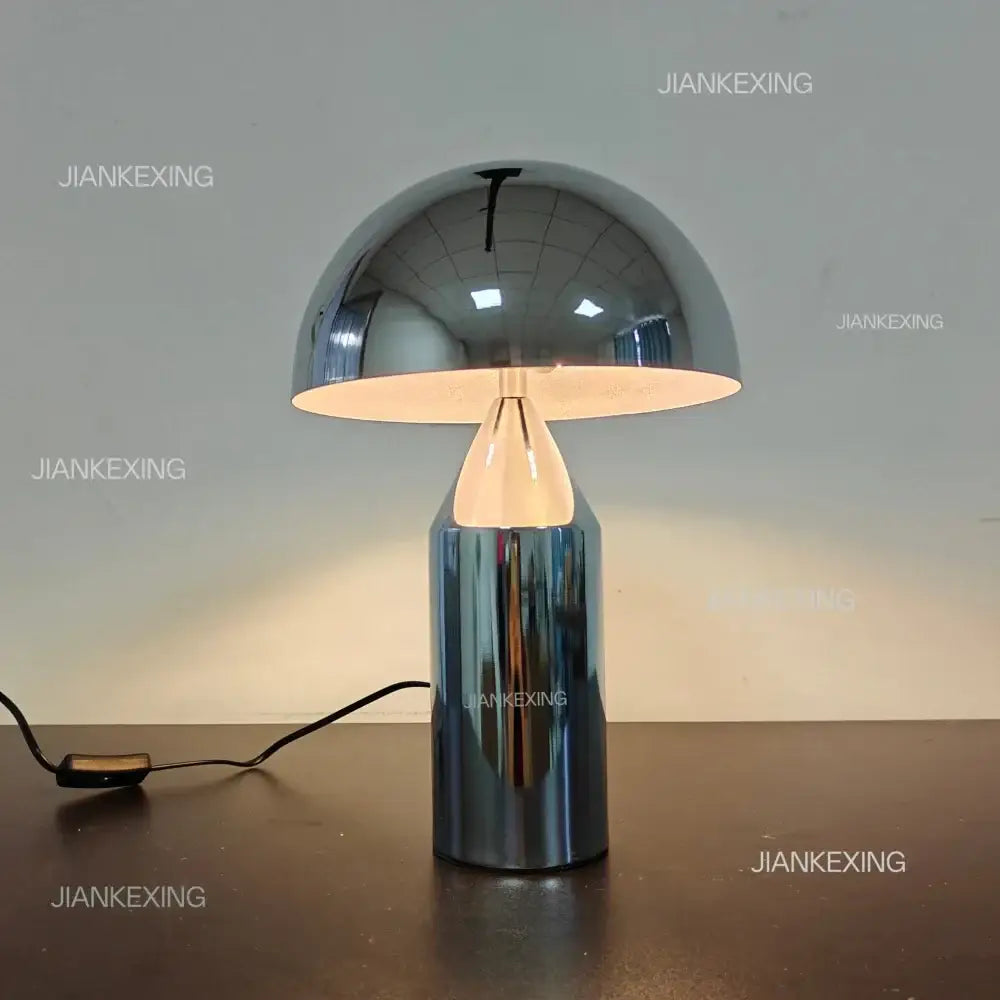 Shiny chrome decorbites designer mushroom desk lamp with sleek cylindrical base in black and gold for bedroom use