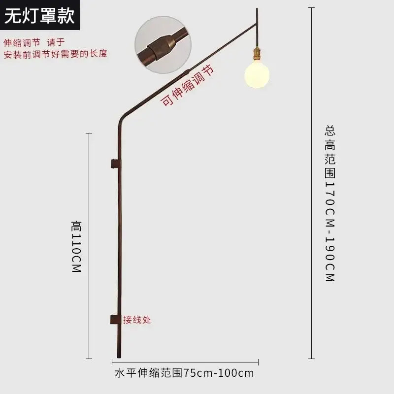 Adjustable bronze-finished swing arm wall lamp with spherical bulb ideal for bedroom reading decorbites gold black style