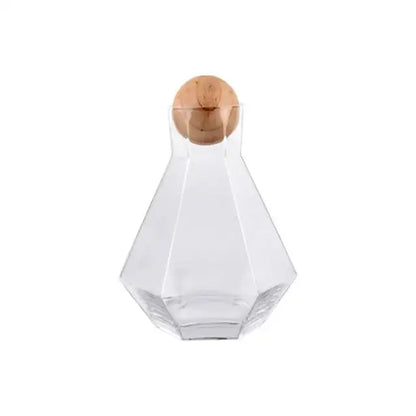 Clear glass water carafe with faceted diamond crystal glass design and round wooden stopper for dining room use