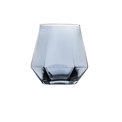 A sleek faceted gray diamond crystal glass tumbler with a modern geometric design for glass water use