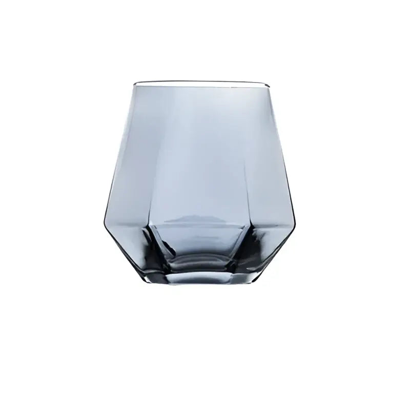 A sleek faceted gray diamond crystal glass tumbler with a modern geometric design for glass water use