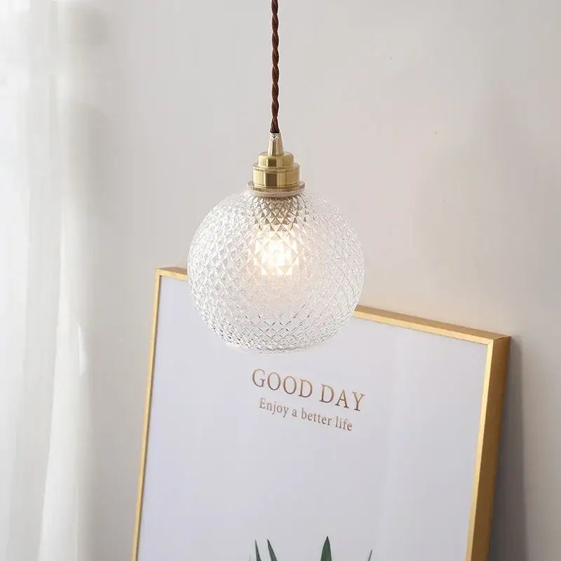 Clear textured glass globe led pendant light with brass finish and twisted brown cord for kitchen decorbites glass globe