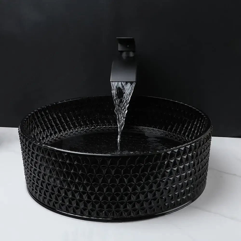 Black ceramic diamond glass basin set with textured pattern and matching matte black faucet for bathroom use