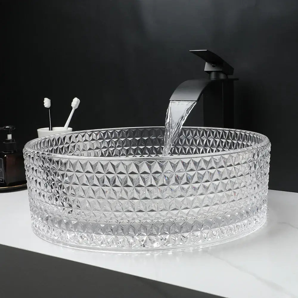 Clear glass diamond glass basin set with geometric cut pattern and matte black faucet for bathroom use