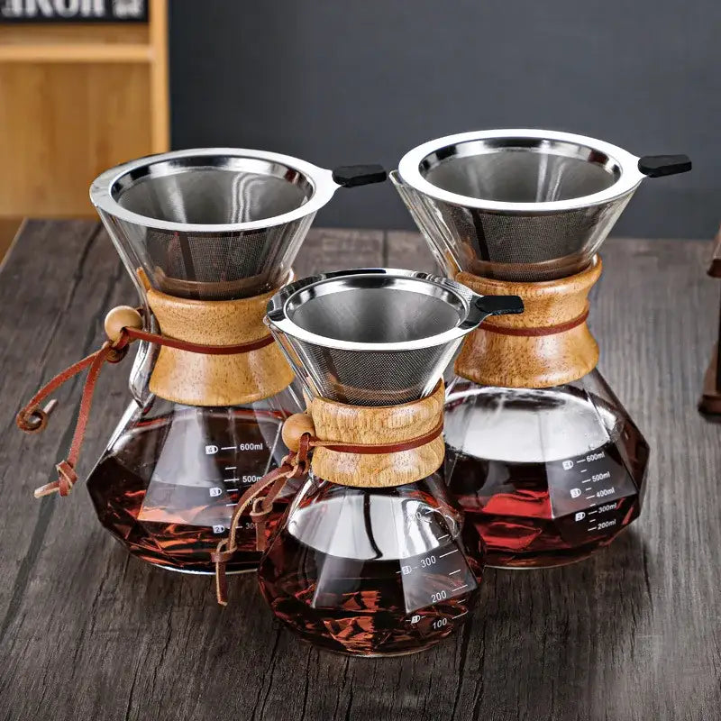 Set of three diamond glass hand brew coffee drippers with stainless steel filters and wooden necks with leather ties