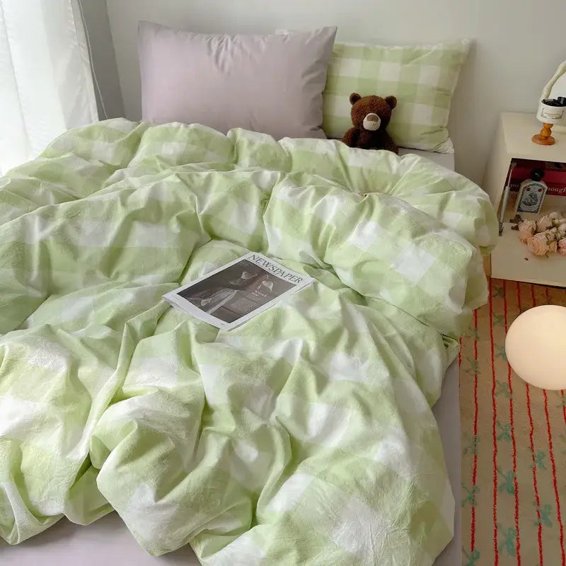 A soft mint green and white checkered diamond jacquard duvet cover with a cozy, skin friendly texture