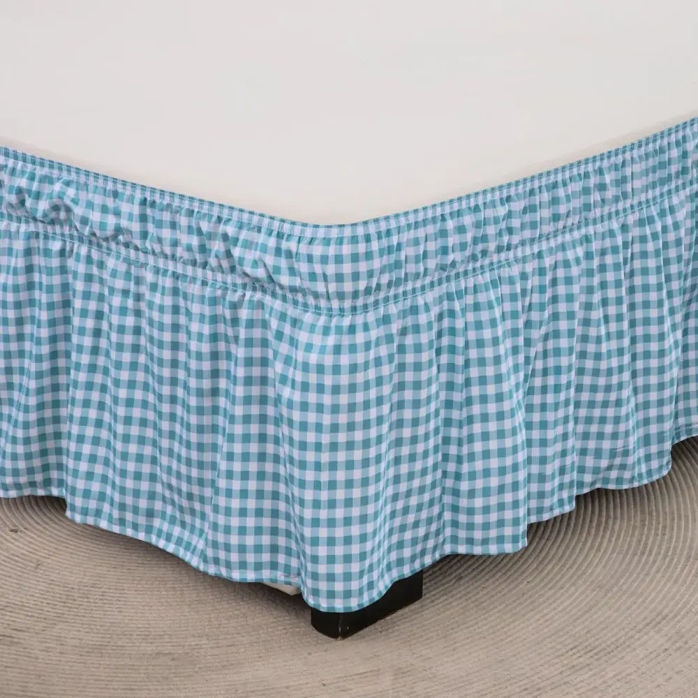 Teal and white gingham bed skirt with ruffled hem featuring diamond lattice ruffled elastic band design