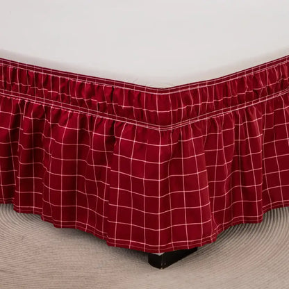 Red plaid bed skirt with white grid pattern and ruffled hem featuring diamond lattice ruffled elastic band design