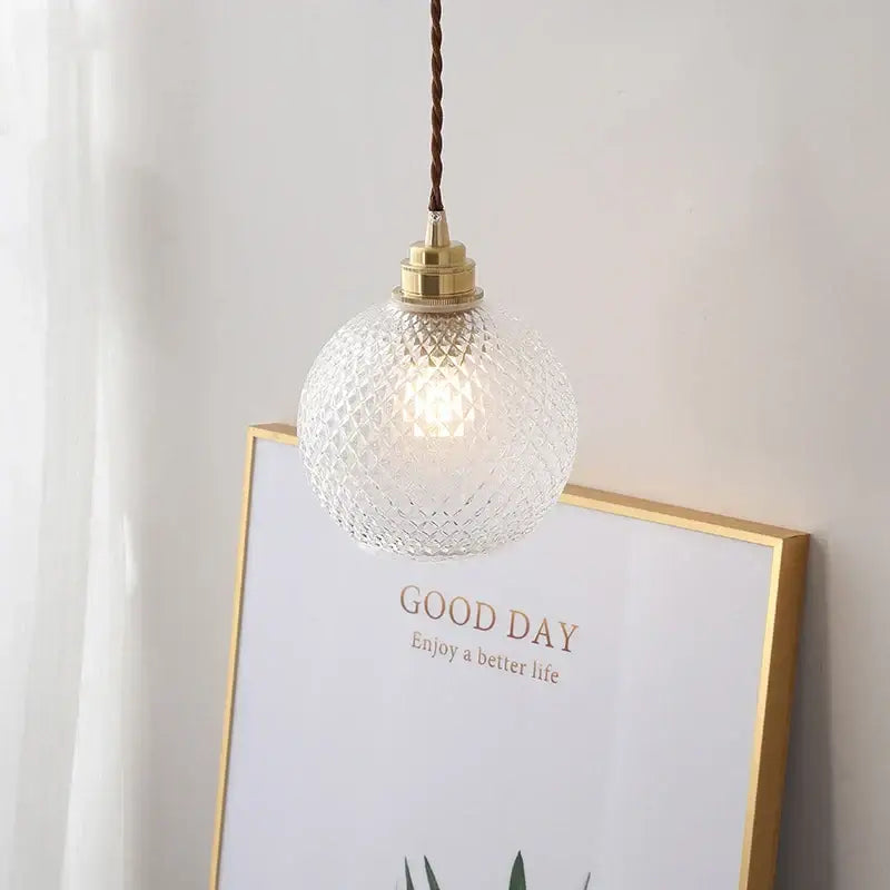 Clear glass ball led pendant light with diamond pattern globe and brass hardware for dining room decorbites pendant light