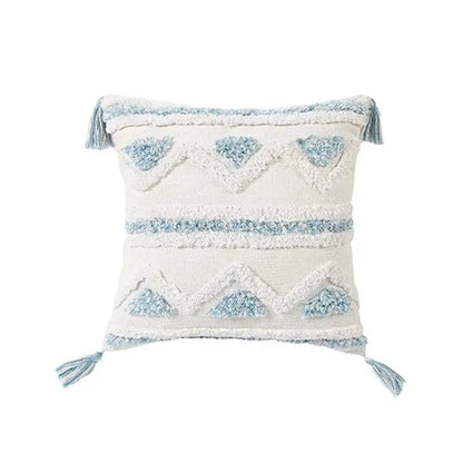Cream-colored cushion cover with light blue geometric embroidery and tassels for living room diamond tufted blue decor