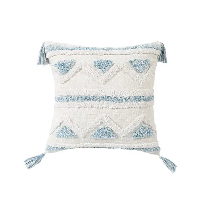 Cream-colored cushion cover with light blue geometric embroidery and tassels for living room diamond tufted blue decor