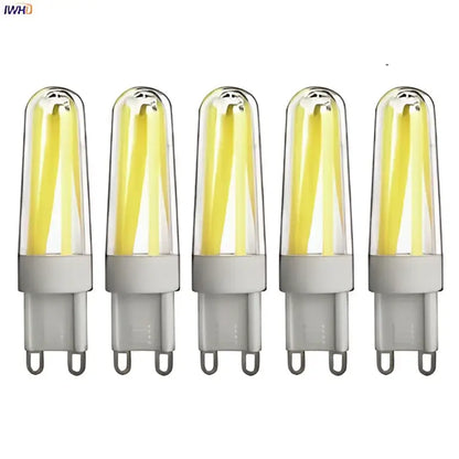 Six dimmable cob led bulbs by decorbites with clear glass filament and warm yellow glow for living room decor
