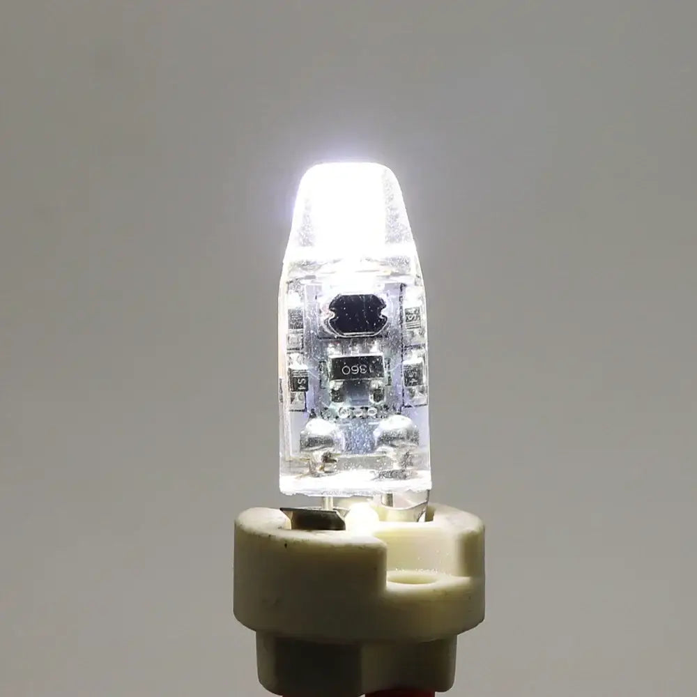 Dimmable g4 led bulb with clear glass and visible circuitry emitting bright white light for living room decorbites dimmable