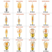 Collection of dimmable vintage led filament bulbs in amber glass with brass bases for decorbites vintage bedroom light