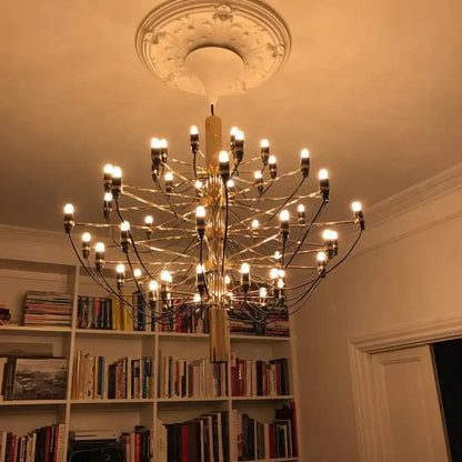 A golden multi-armed decorbites dimmable vintage led filament chandelier with amber glass bulbs and black cords