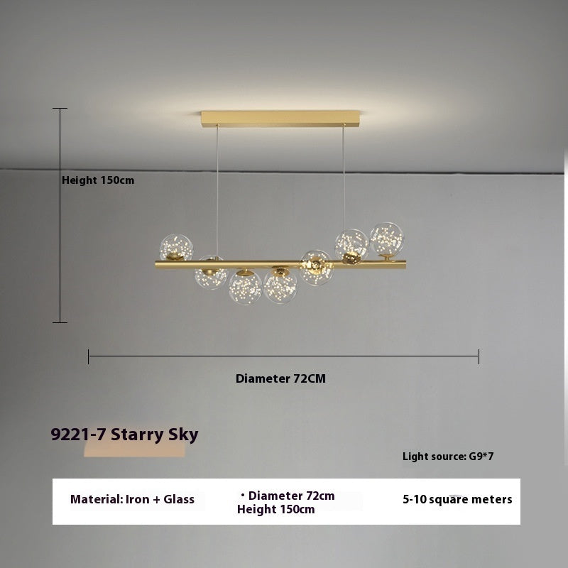 Gold starry sky chandelier with glass globe accents and iron frame, 5-10 square meters coverage.