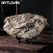 Artlovin™ dinosaur fossil resin craft sculpture with detailed skeletal imprint on textured stone and dark metallic stand decorbites dinosaur fossil