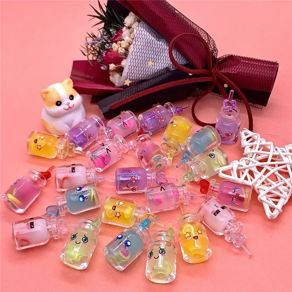 A collection of colorful transparent plastic diy heart pearl shell miniature wishing bottles with cute faces for decorbites decor
