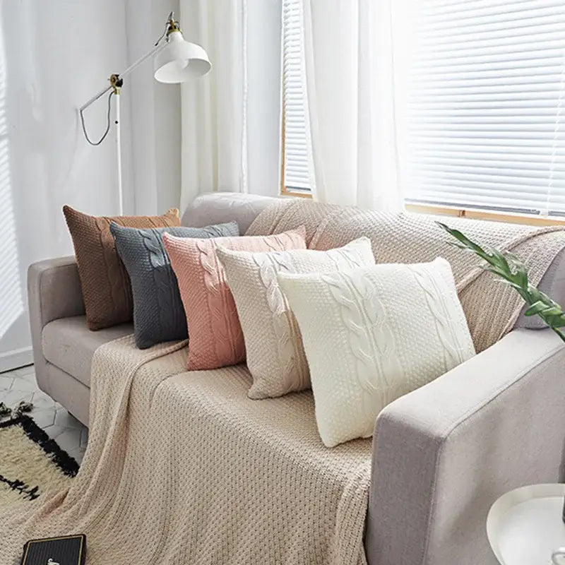 Set of five pastel and neutral double cable knit cushion covers with textured cable knit design for living room pillows