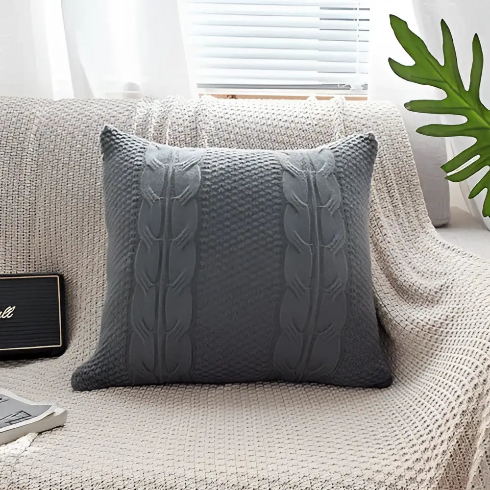 Gray knitted throw pillow with double cable knit pattern in cushion cover for living room decor use