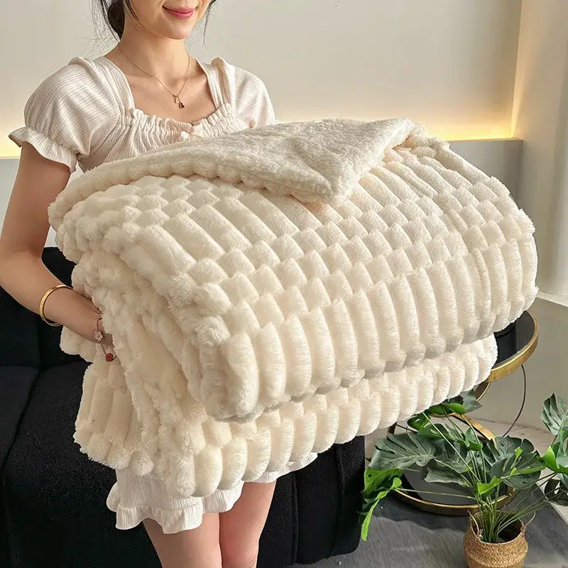 Cream-colored double layer lamb plush throw blanket with textured ribbed knit and soft fuzzy fleece surface for bedroom use