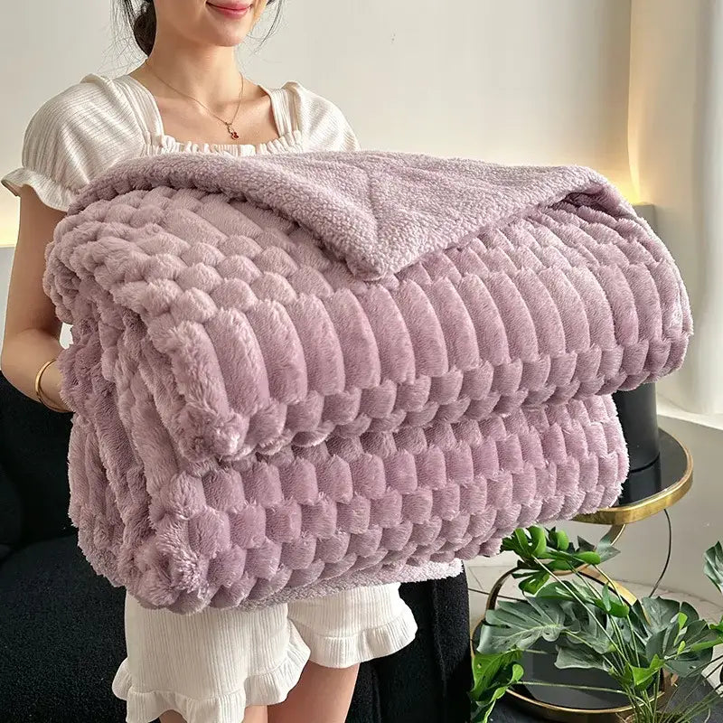 A lavender double layer lamb plush throw blanket with soft textured fleece and chunky knit pattern for bedroom use